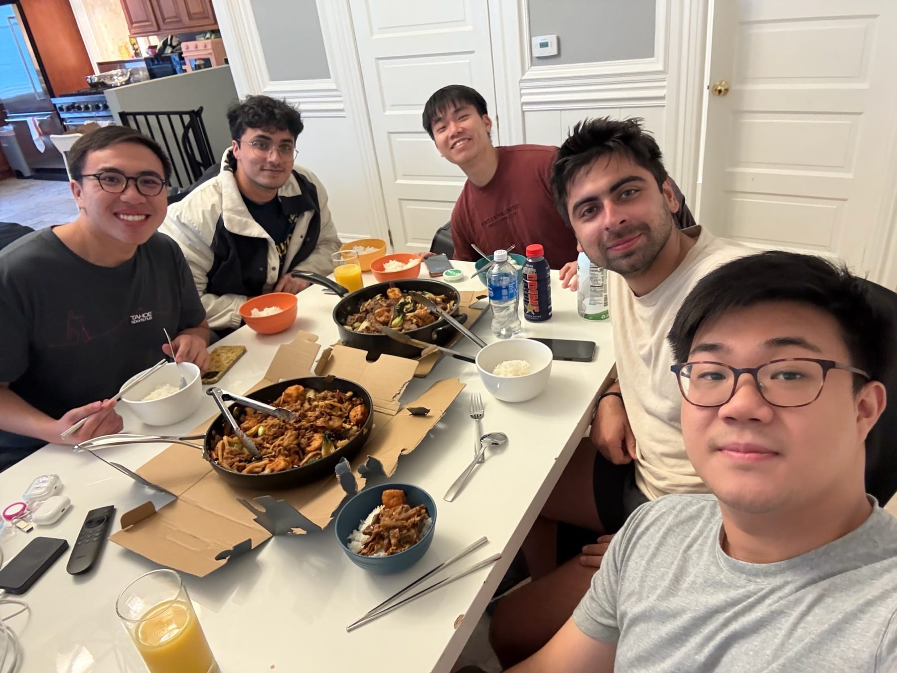 Housemates cooking a shared meal
